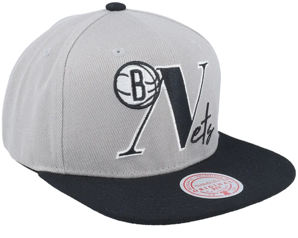 Mitchell & Ness Men's NBA Top Letter Snapback Nets Snapback Caps sold by Zulily