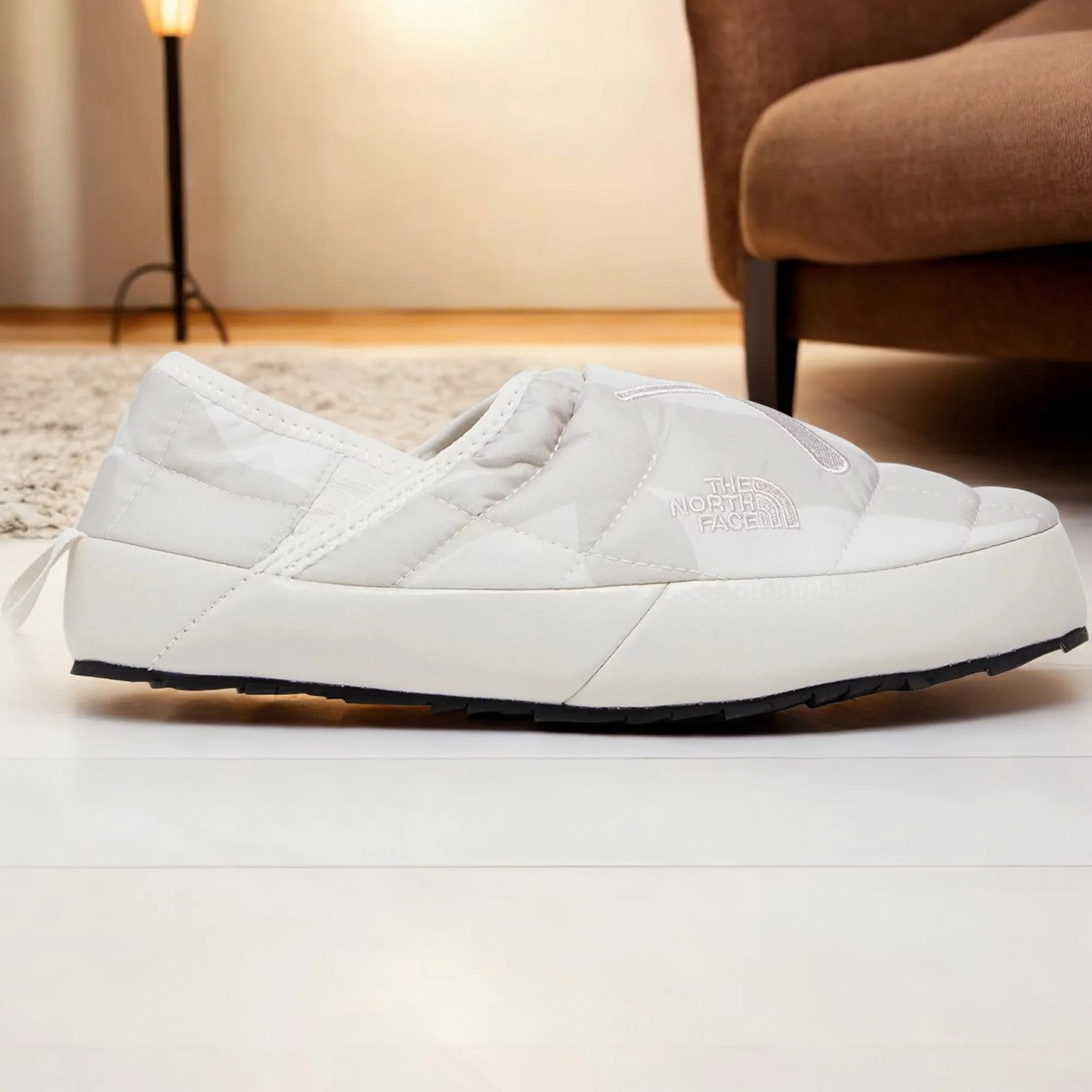 The North Face Women's Thermoball Traction Mule Vp 'Kaws Moonlight Ivory D2 Nuptse Print W' Mules sold by Zulily