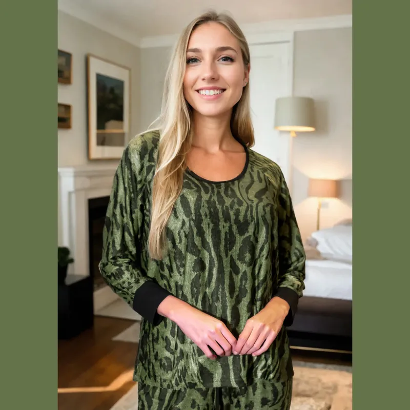 Relevate Designs Green And Black Animal Print Long Sleeve Top made by Zulily