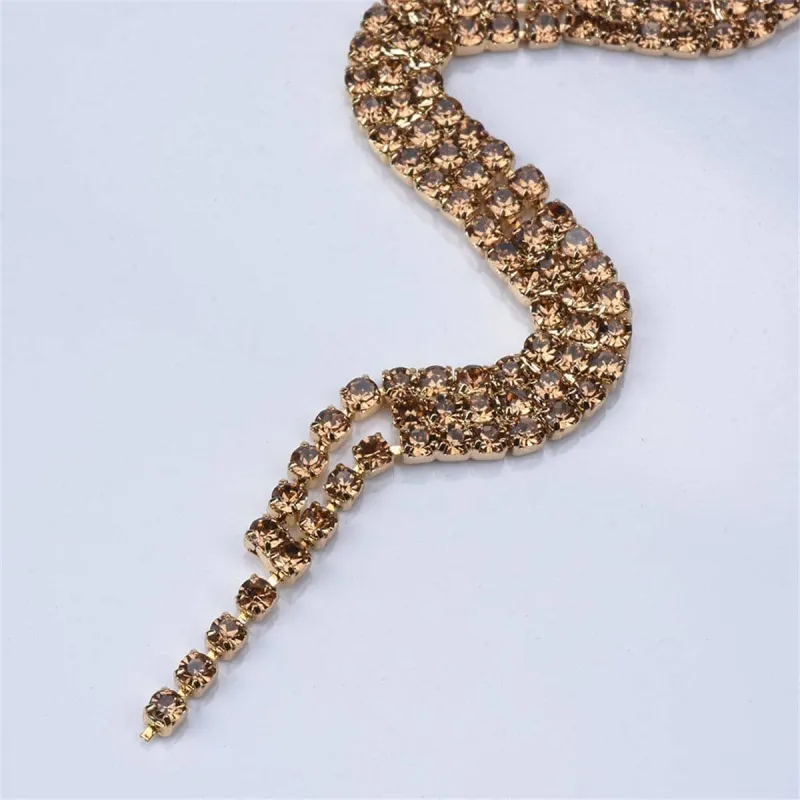Cubic Zirconia & Goldtone Snake Drop Earrings made by Zulily