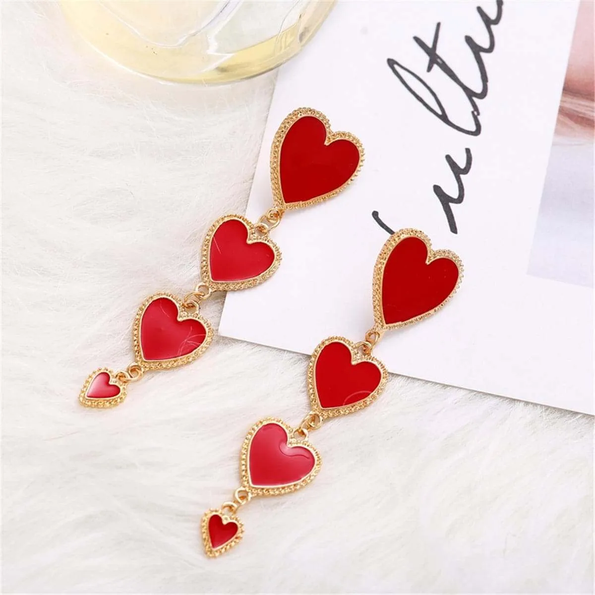 Red Enamel Heart Drop Earrings sold by Zulily
