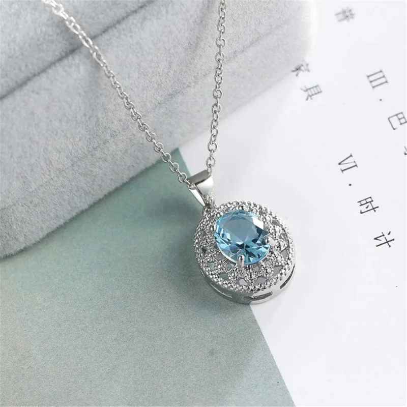 Sea Blue Crystal & Silvertone Oval Pendant Necklace made by Zulily
