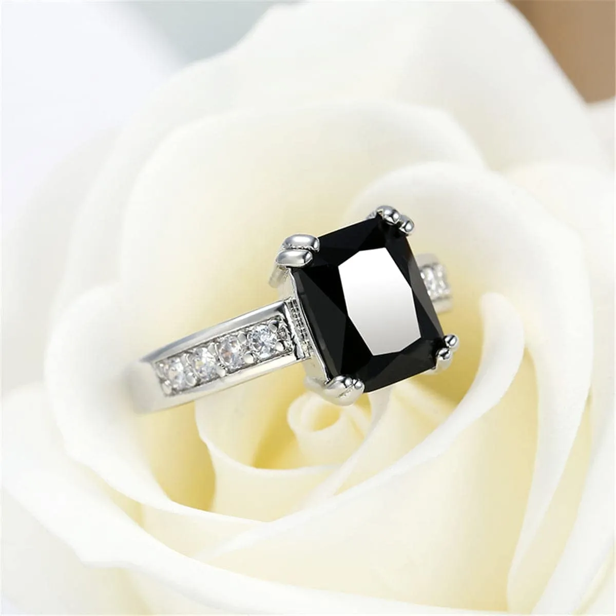 Black Crystal & Silvertone Rectangle Solitaire Ring sold by Zulily