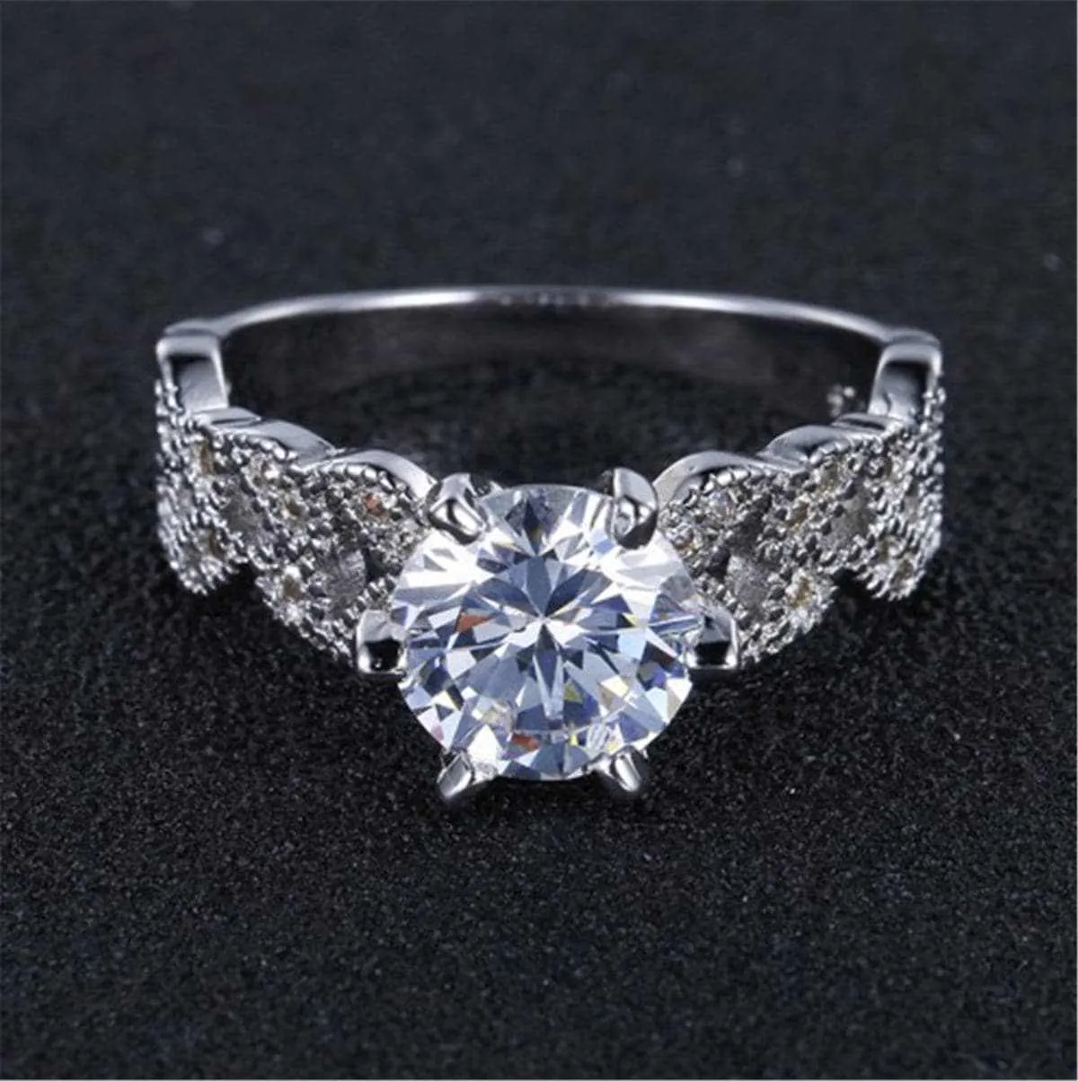 Crystal & Silvertone Leaf Band Ring sold by Zulily