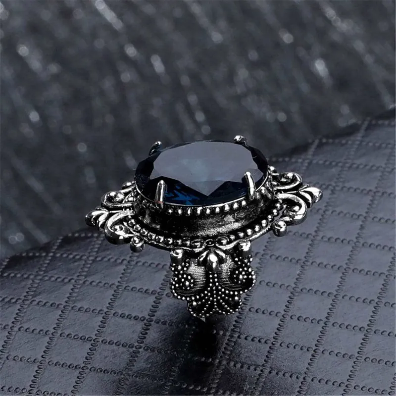 Blue Crystal & Silvertone Oval Filigree Ring made by Zulily
