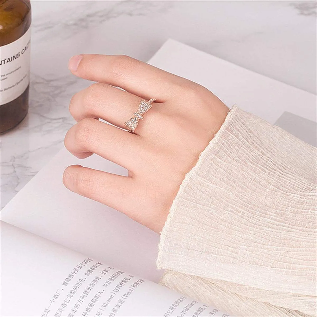 Cubic Zirconia & Rose Goldtone Bow Band Ring sold by Zulily product image thumbnail 5