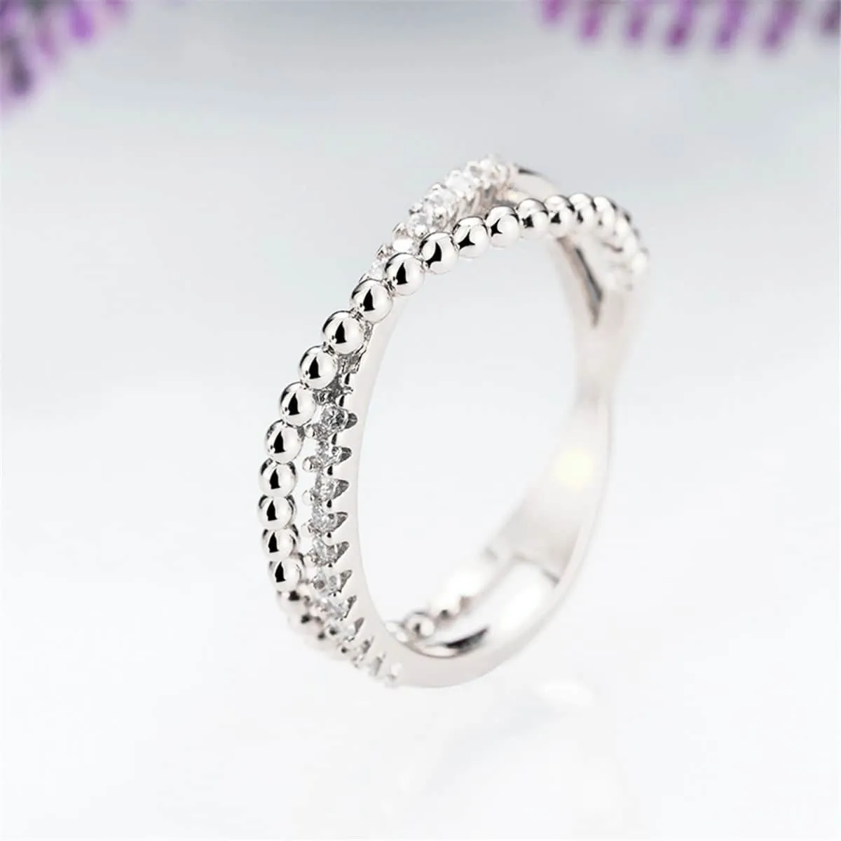 Cubic Zirconia & Silvertone Crossed Line Ring sold by Zulily