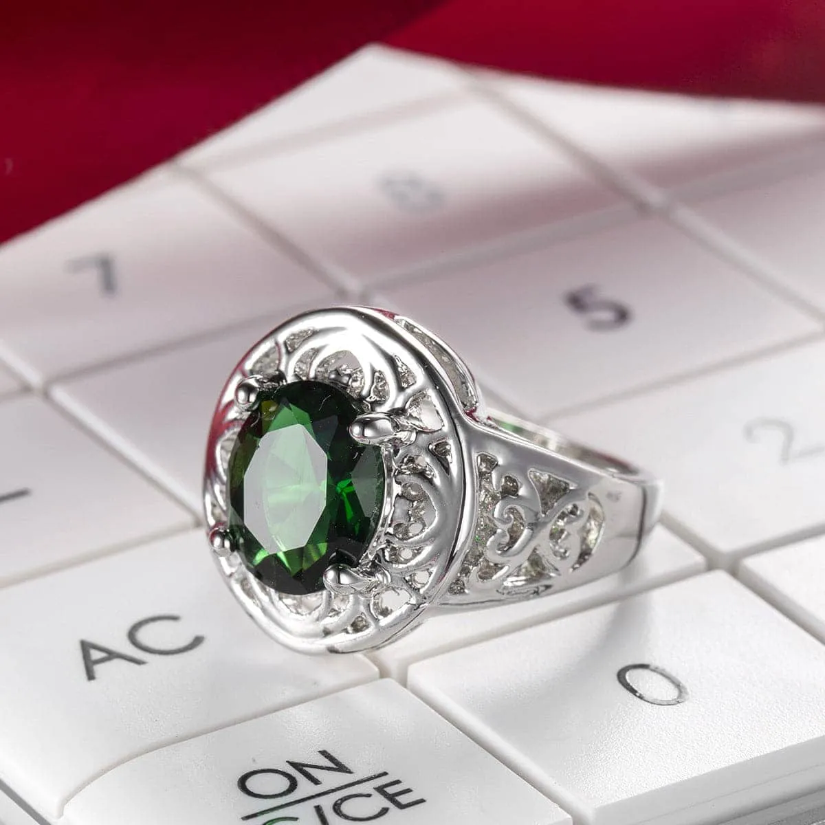 Green Crystal & Silvertone Floral Ring sold by Zulily
