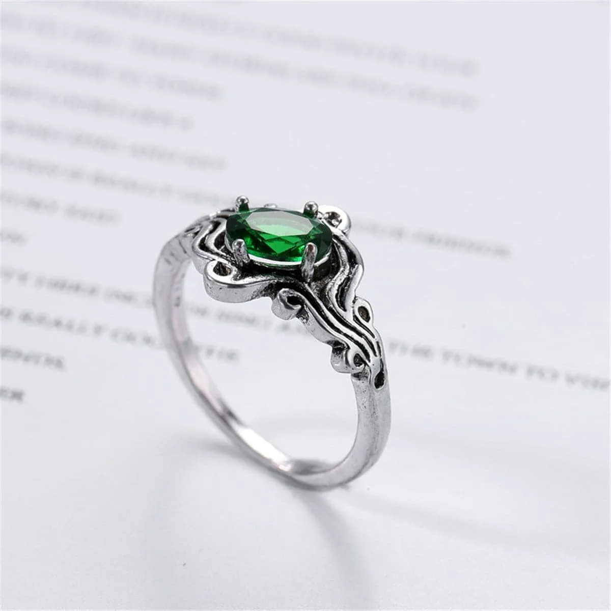 Green Crystal Wavy Band Ring sold by Zulily
