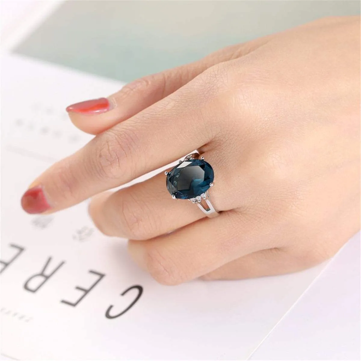 Navy Crystal & Silvertone Oval-Cut Cocktail Ring sold by Zulily
