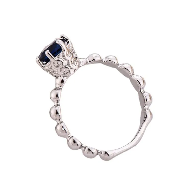 Navy Crystal & Silvertone Cocktail Ring sold by Zulily