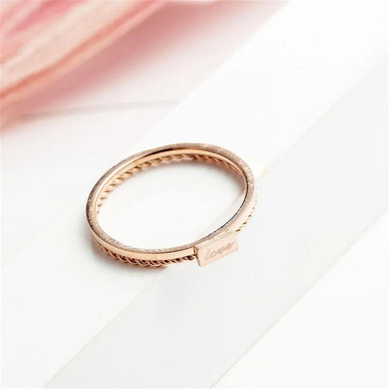 Rose Goldtone 'Love' Rope-Band Ring made by Zulily