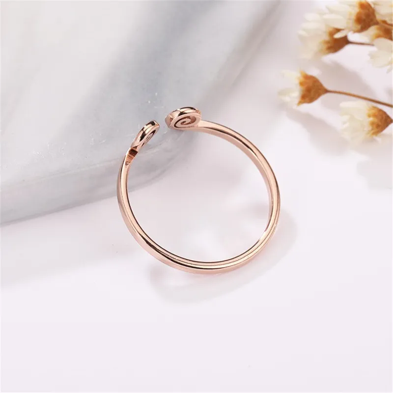 Rose Goldtone Swirl Band made by Zulily