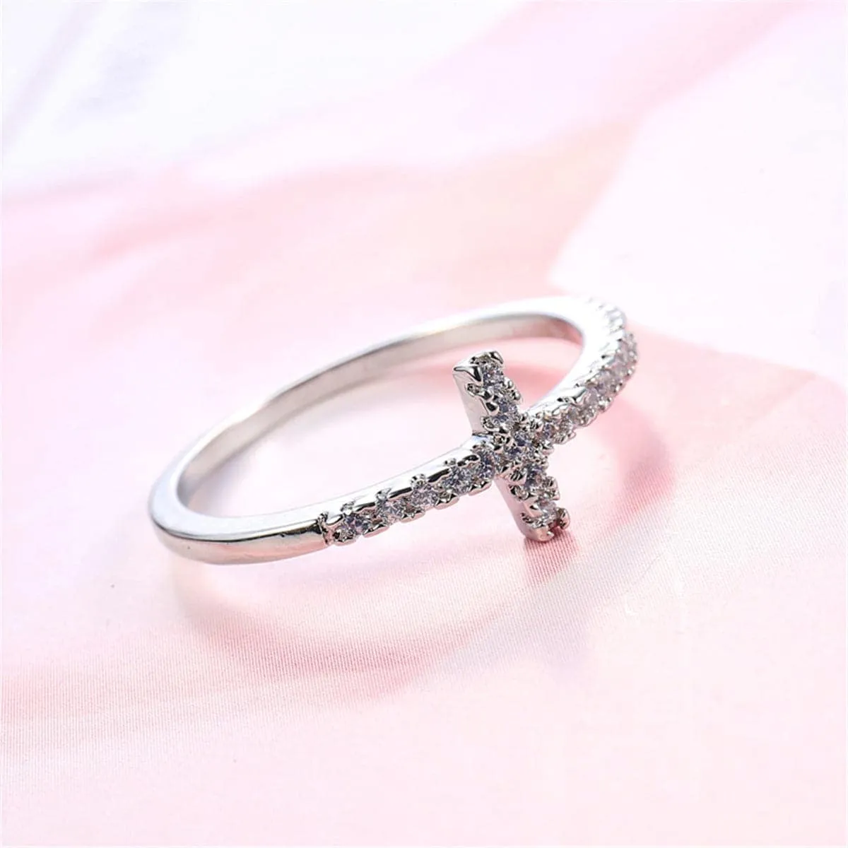 White Cubic Zirconia Cross Ring sold by Zulily