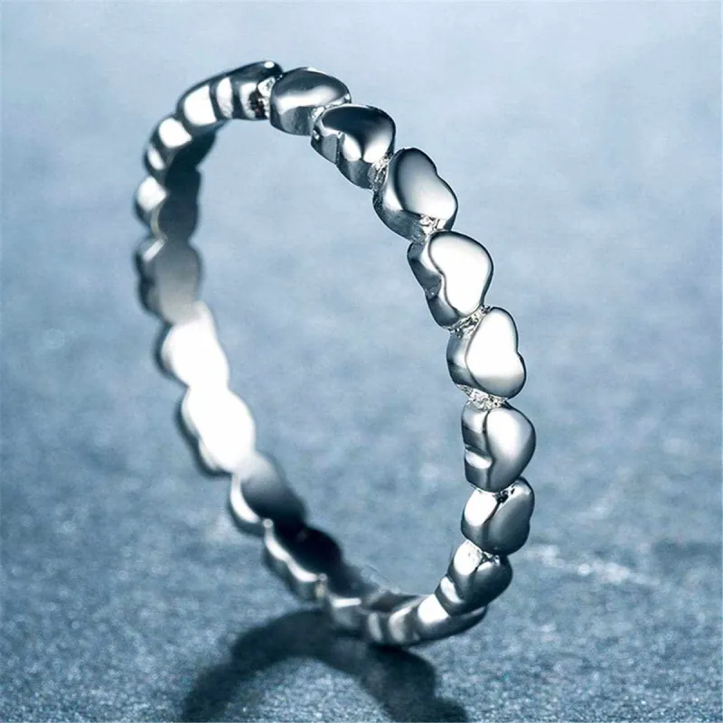 Silvertone Interlocking Heart Band made by Zulily