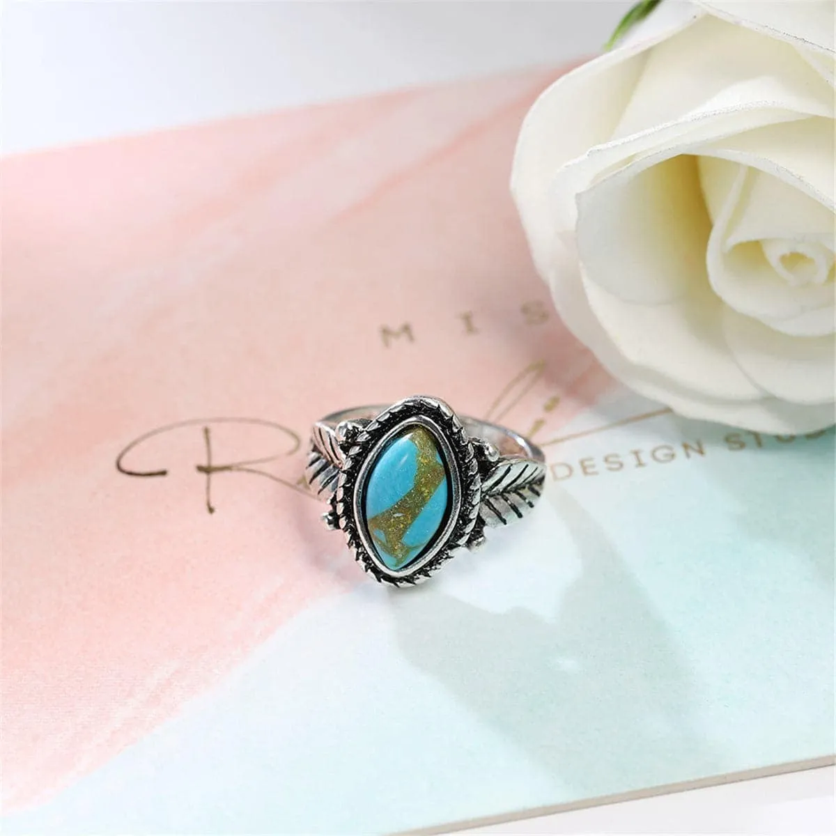 Turquoise & Silvertone Leaf Ring sold by Zulily