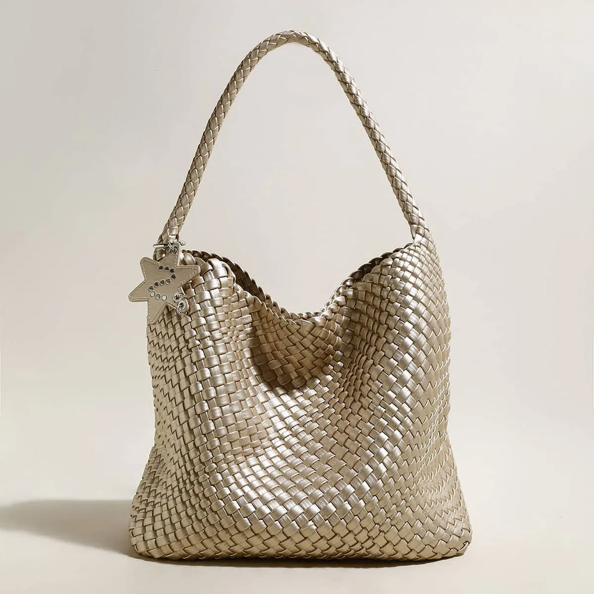 Metallic Champagne Woven Tote sold by Zulily