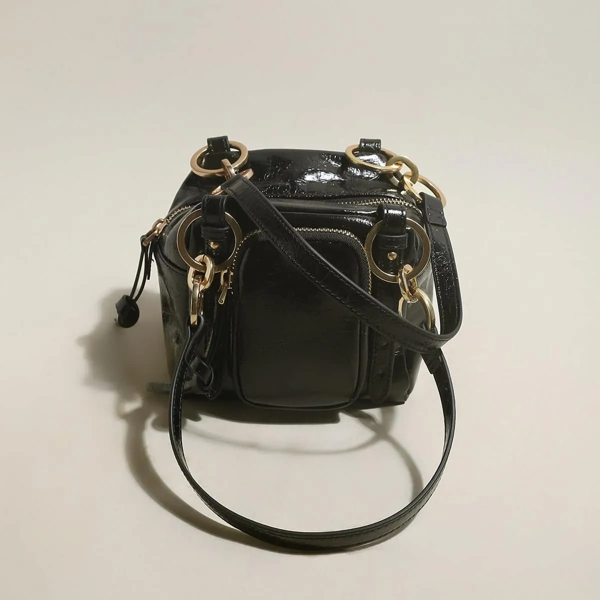 Two Way Shiny Wrinkled Leather Shoulder Bag sold by Zulily