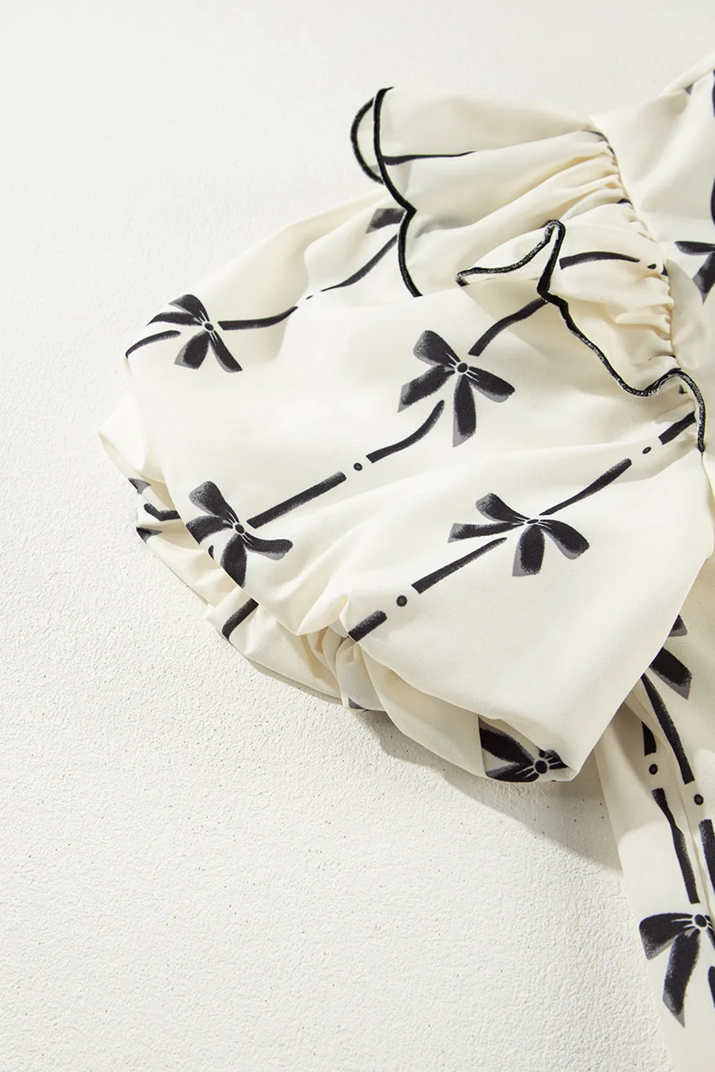 Threaded Pear Maisie Bow Bubble Sleeve Blouse sold by Zulily product image thumbnail 4