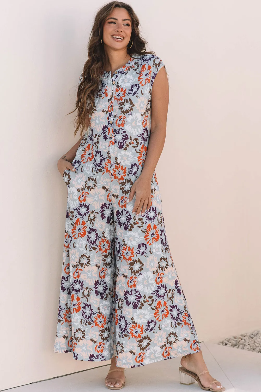 Threaded Pear Kylee Floral Sleeveless Buttoned Wide Leg Jumpsuit sold by Zulily