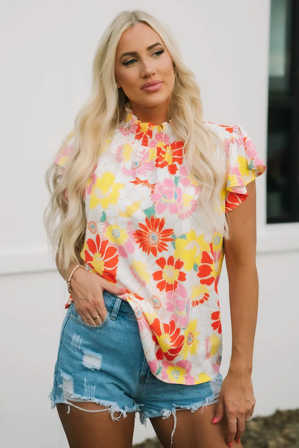Threaded Pear Judith Multicolor Flutter Sleeves Floral Blouse sold by Zulily