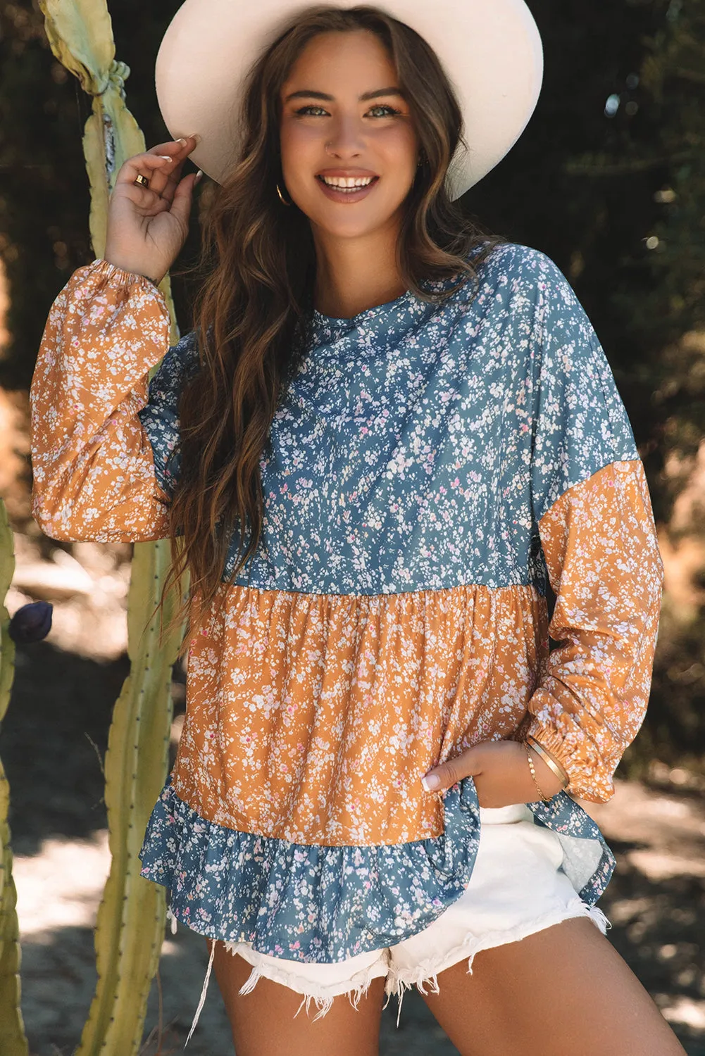 Threaded Pear Cecilia Floral Ruffled Hem Round Neck Blouse sold by Zulily