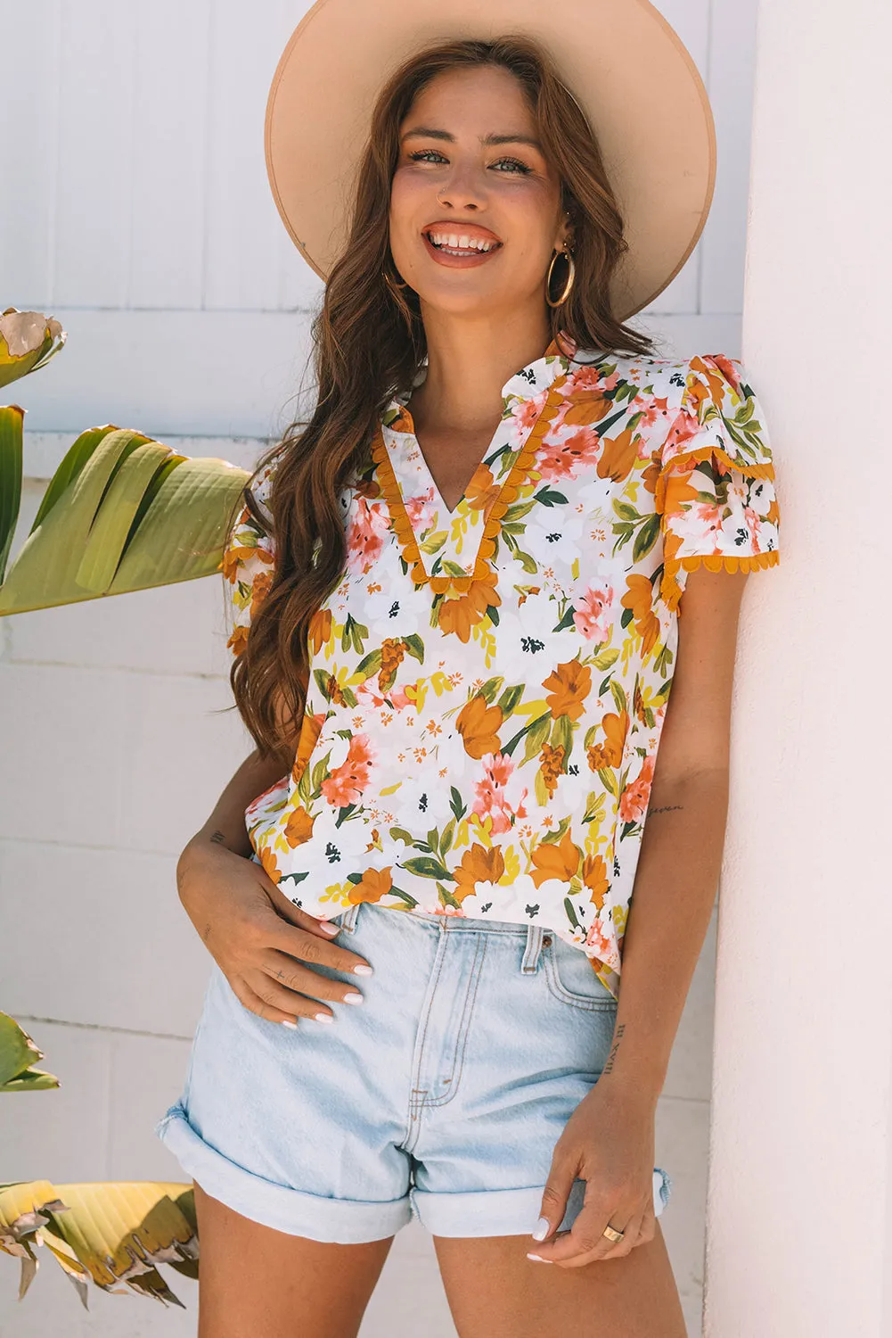 Threaded Pear Ailany Short Sleeve Floral Blouse sold by Zulily product image thumbnail 5