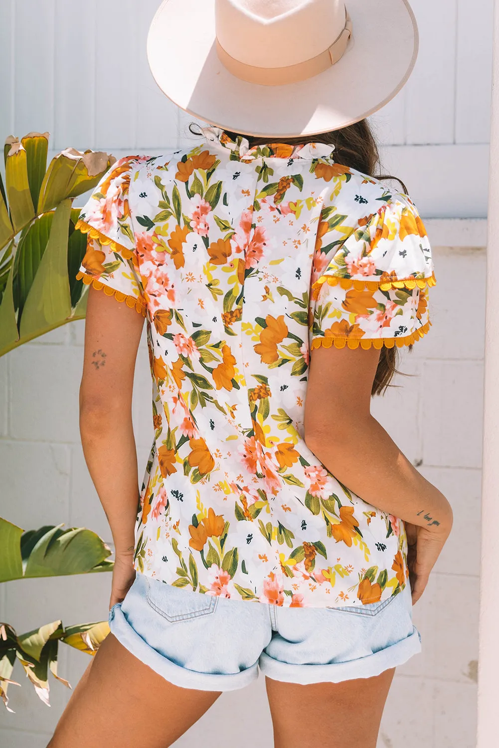 Threaded Pear Ailany Short Sleeve Floral Blouse sold by Zulily product image thumbnail 2