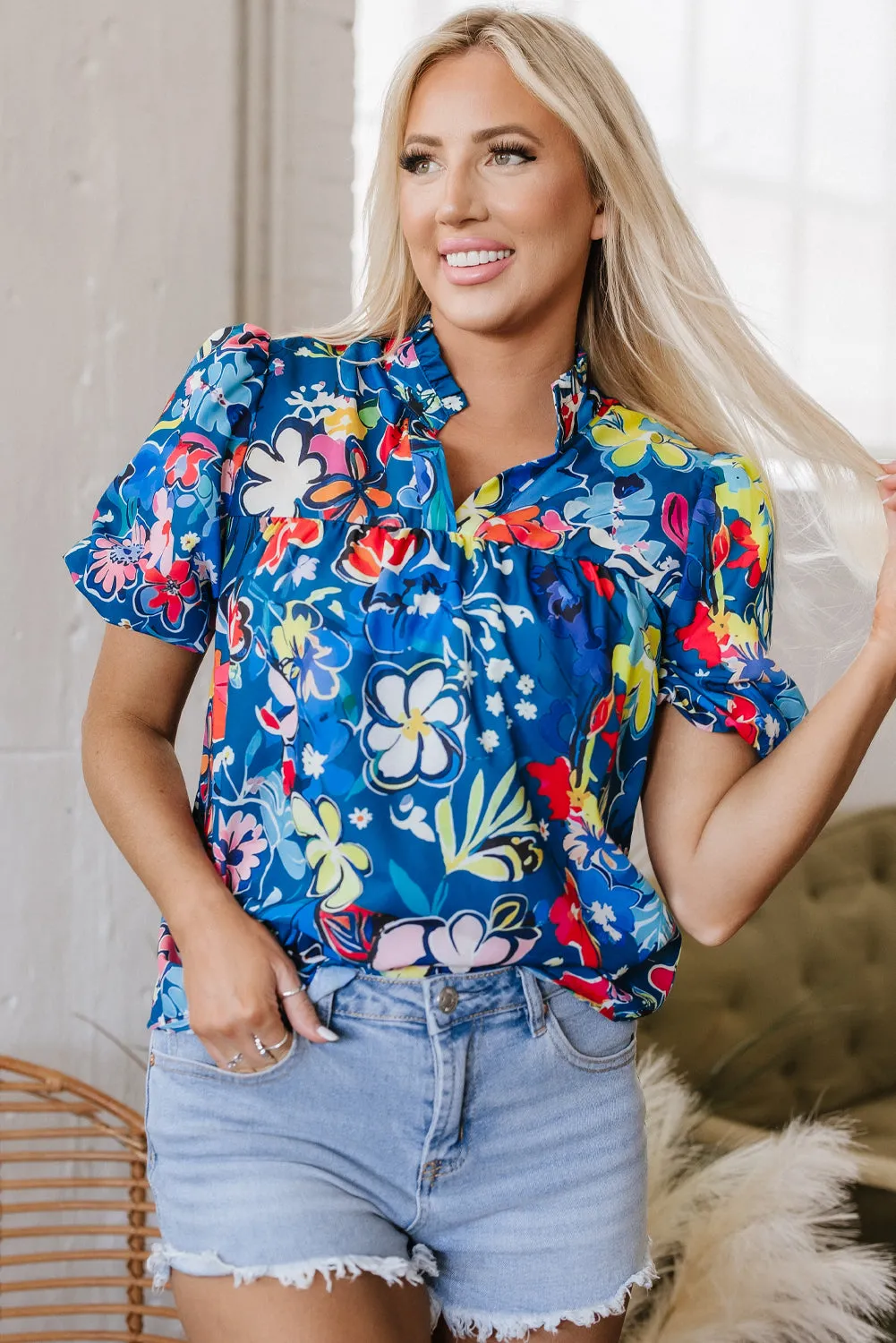 Threaded Pear Ainara Flower Puff Short Sleeve Loose Blouse sold by Zulily