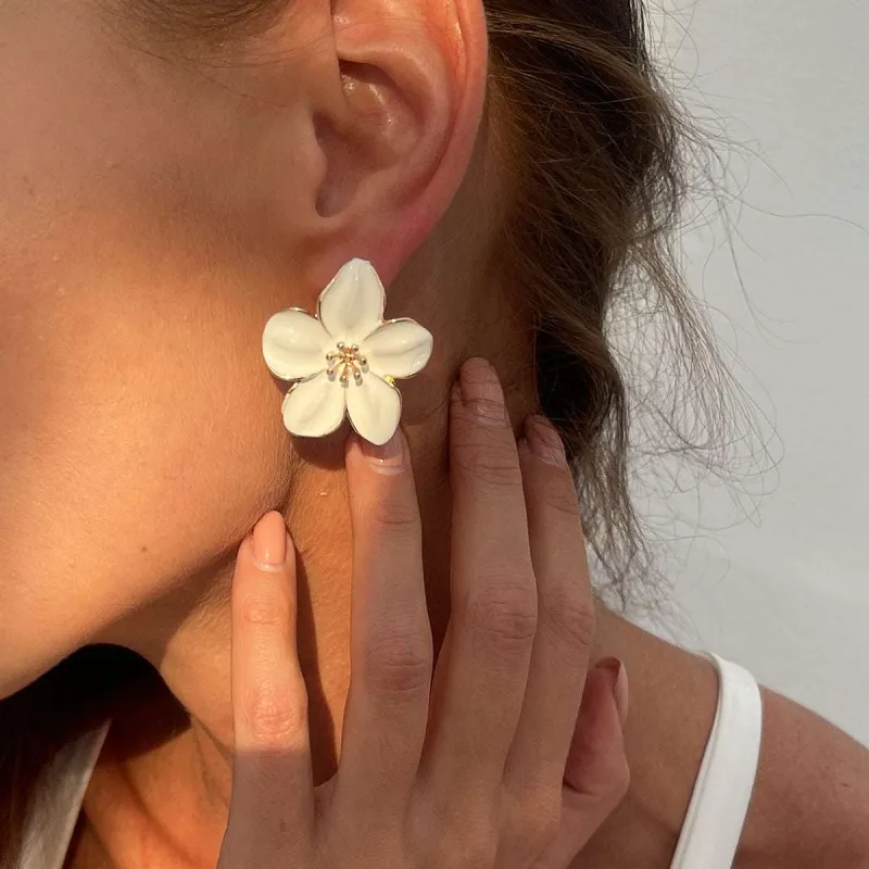White Enamel & Goldtone Flower Stud Earrings made by Zulily