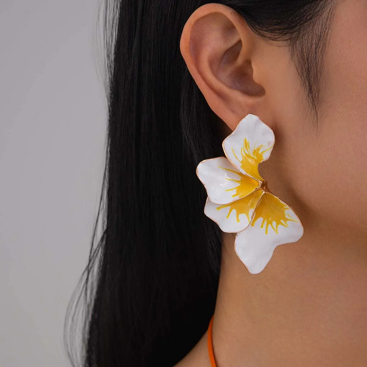 White & Yellow Enamel Goldtone Petals Stud Earrings sold by Zulily