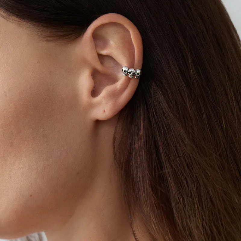 Silvertone Three-Skulls Ear Cuff made by Zulily