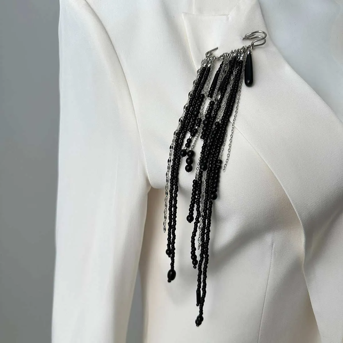Black Crystal & Acrylic Silvertone Drop Tassel Pin Brooch sold by Zulily