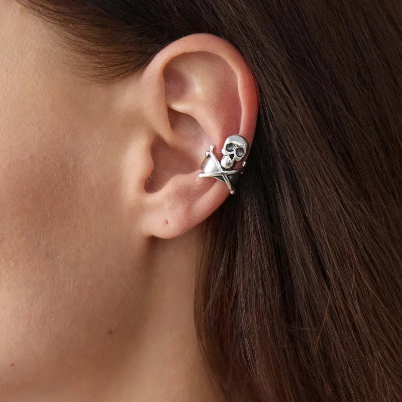 Silvertone Skull X Ear Cuff made by Zulily