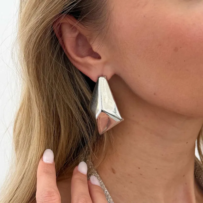 Silvertone 3D Diamond Cut Statement Stud Earrings made by Zulily