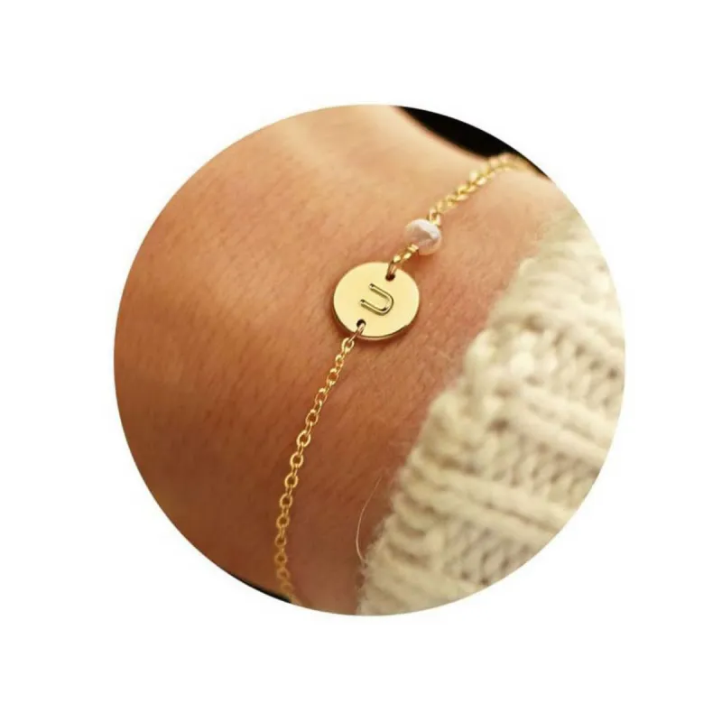 Initial Pearl Charm Bracelet made by Leo Rosi