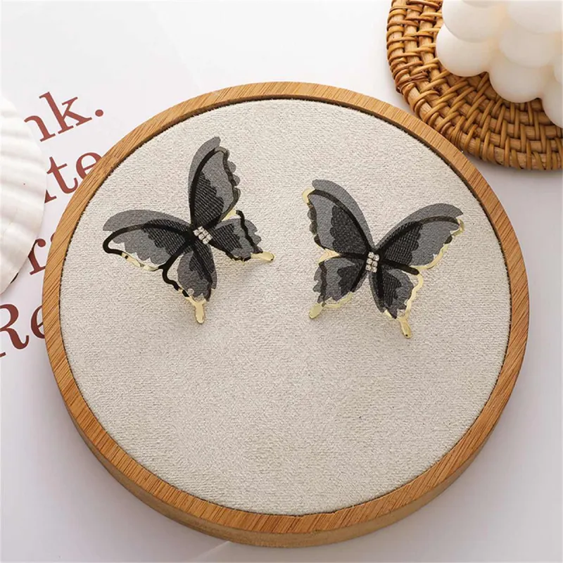 Black Mesh & Goldtone Butterfly Stud Earrings made by Zulily