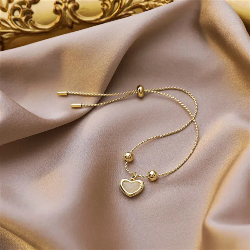 Cats Eye & Goldtone Heart Charm Adjustable Bracelet made by Zulily