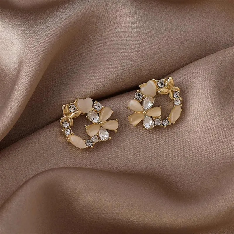 Cubic Zirconia & Crystal Cats Eye Goldtone Flower Circle Stud Earrings made by Zulily