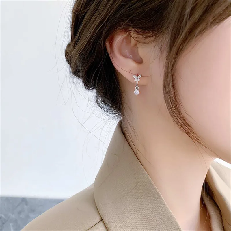 Cubic Zirconia & Silvertone Butterfly Huggie Earrings made by Zulily