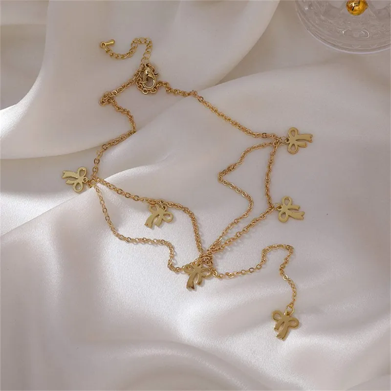 Goldtone Bow Station Drop Choker Necklace made by Zulily