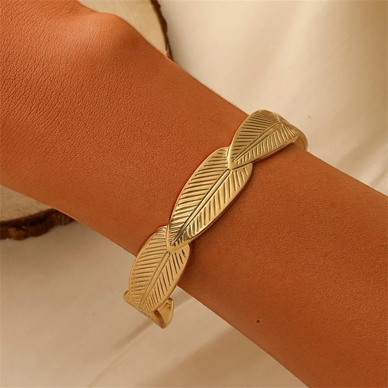 Goldtone Linked Feather Cuff made by Zulily