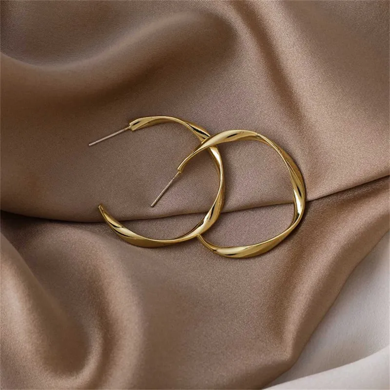 Goldtone Twist Open Hoop Earrings made by Zulily