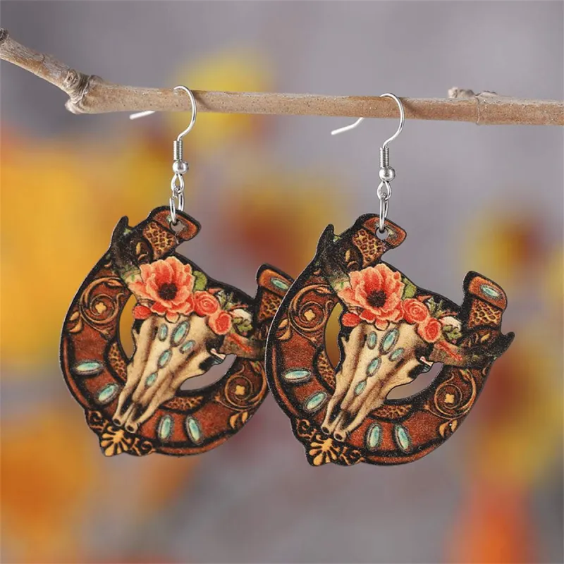 Orange & Brown Horseshoe & Floral Cow Skull Drop Earrings made by Zulily
