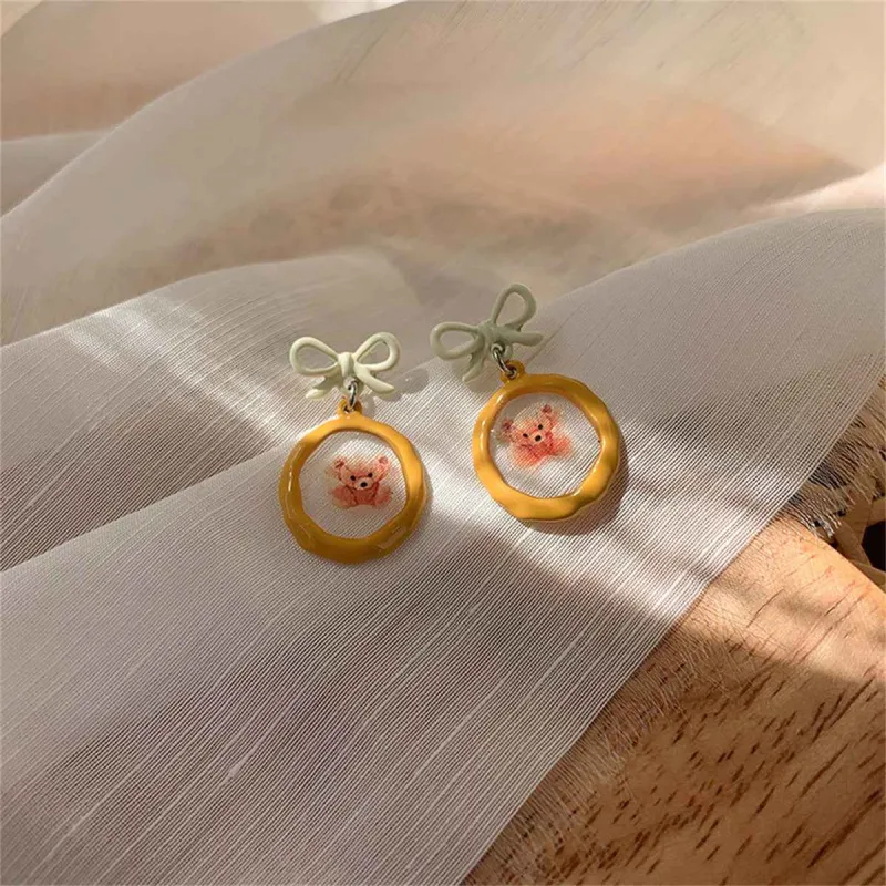 Orange Enamel & Silvertone Bow Bear Drop Earrings made by Zulily
