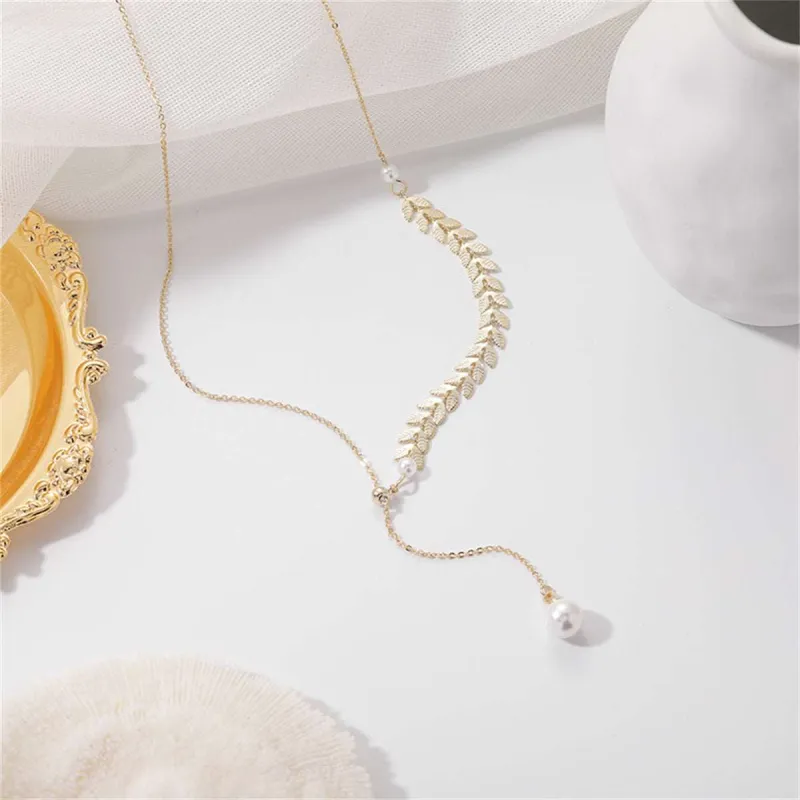 Pearl & Goldtone Leaves Lariat Necklace made by Zulily