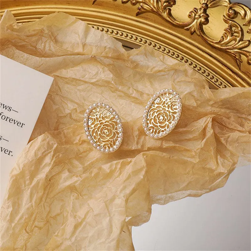 Pearl & Goldtone Floral Oval Stud Earrings made by Zulily