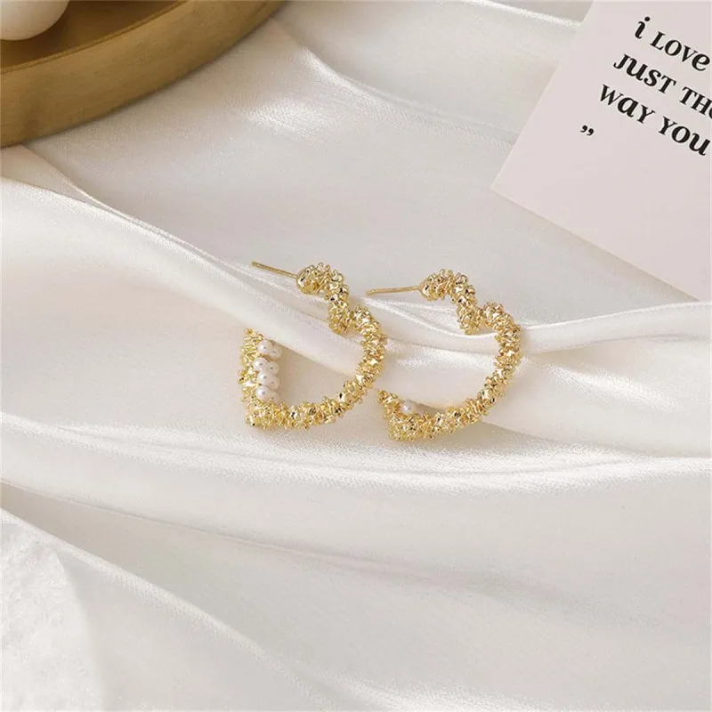 Pearl & Goldtone Textured Heart Huggie Earrings made by Zulily