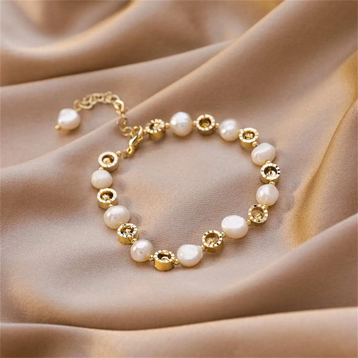 Pearl & Goldtone Station Bracelet sold by Zulily
