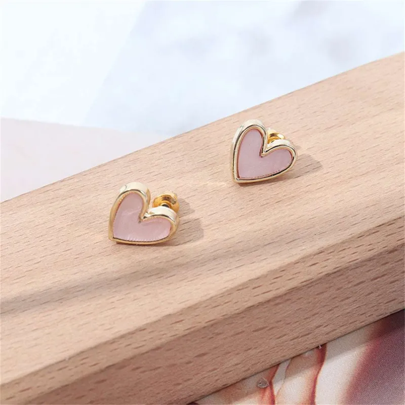 Pink Acrylic & Goldtone Heart Stud Earrings made by Zulily